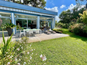 Beautiful flowery garden, pool and pleasant house
